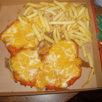 Parmo en su caja de pizza